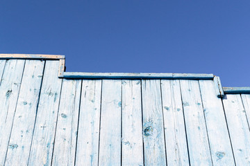Fototapeta premium Faded Blue Wood Wall Fence