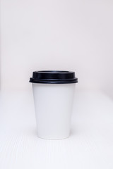 paper cup with hot coffee