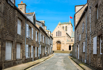 Fototapeta na wymiar France, Normandy, Barfleur, the old houses and the church of the old village.