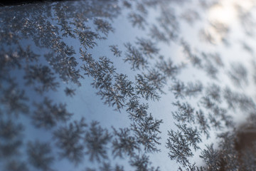 Frosted Glass with Cold Winter Snowflake Patterns