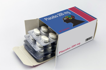 Open medicine packet labelled placebo opened at one end to displ