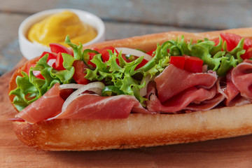  sandwich baguette ham jamon with tomato and herbs