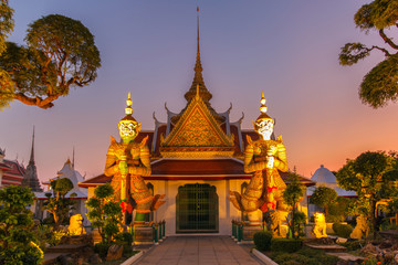 Two statue giant at churches Wat Arun, Bankok Thailand.