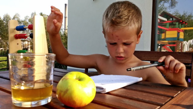 Little boy doing homework
