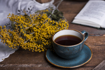 Cup of coffee on a wooden table