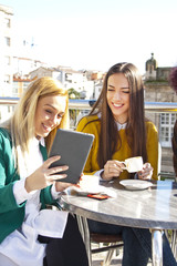 group of friends with the tablet