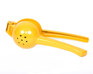 Yellow lemon squeezer separated on white background