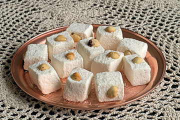  Turkish delight.   Turkish delight on a tray made of copper on a napkin
 