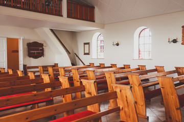 A classic catholic lutheran small church interior with no people inside