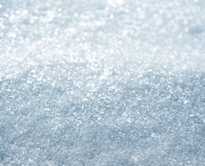 texture of white snow sparkling in the sun