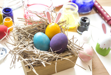 Fototapeta na wymiar Coloring Easter Eggs for easter day concept