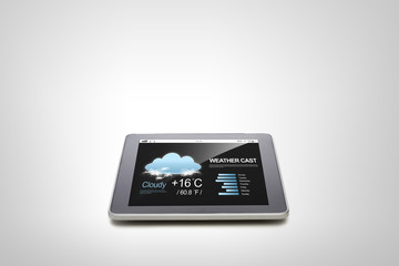 close up of tablet pc computer with weather cast