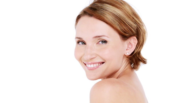 Beautiful healthy smiling woman with fresh  skin of face over white background