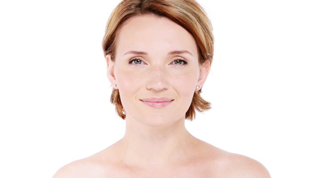 Beautiful healthy smiling woman with fresh  skin of face over white background