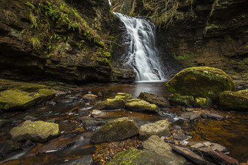 Fototapeta na wymiar Hareshaw Linn. Waterfall near Bellingham in the county of Northumberland, England, UK.