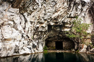 Fototapeta na wymiar Cave in flooded marble quarry in Karelia