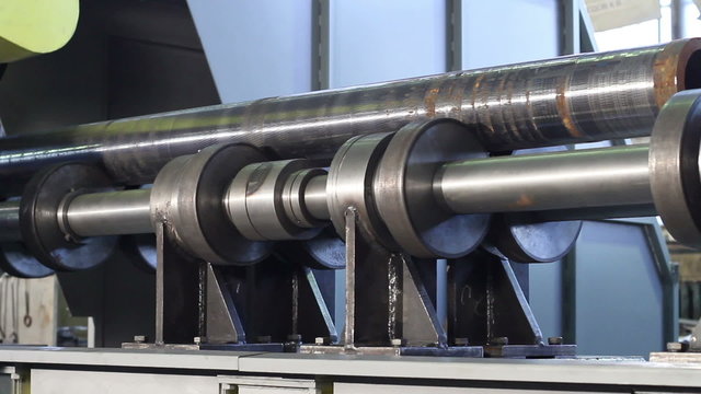 The movement of the workpiece lieing on the platform for grinding