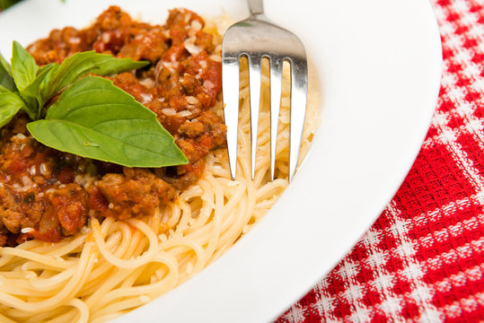 Pasta with tomato sauce and basil, food. Italian food