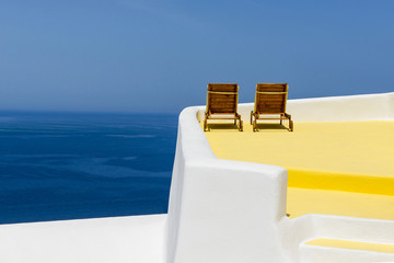 Loung chairs with sea view in Santorini, Greece