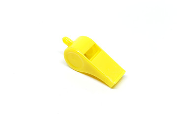 Yellow whistle white background.