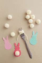 Easter craft of making yarn pom pom bunny tail with a fork