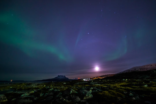 Moon shining and the northern lights, nearby Nuuk, Greenland