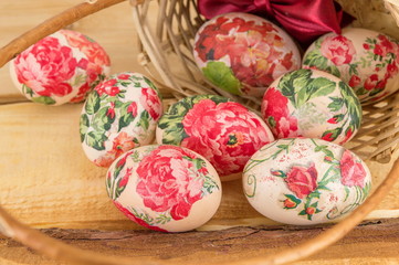 Decorated Easter eggs falling out of basket