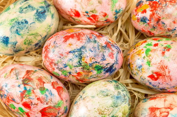 Painted Easter eggs on a straw nest