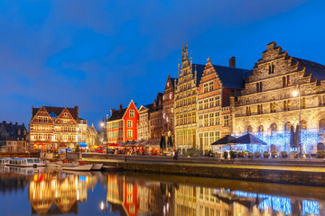 Fototapeta na wymiar Picturesque medieval buildings on the quay Graslei in Leie river at Ghent town at morning, Belgium