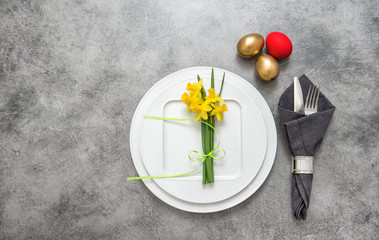 Easter table decoration cutlery, eggs flowers