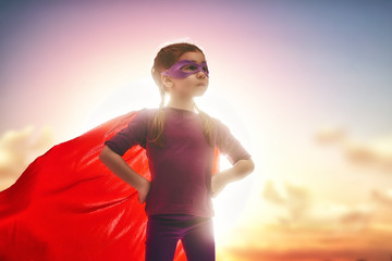 girl plays superhero © Konstantin Yuganov