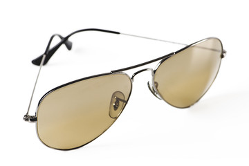 Modern sunglasses on white background