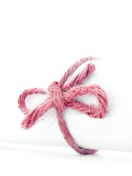 White Red Rope Bow, Twine Ribbon Tied Knot, White Isolated Stock
