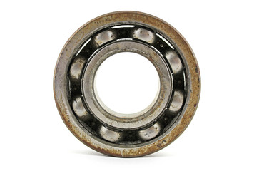 Old rusty bearing on a white background