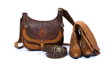 Women's leather bags and accessories - boots, strap on a white background.