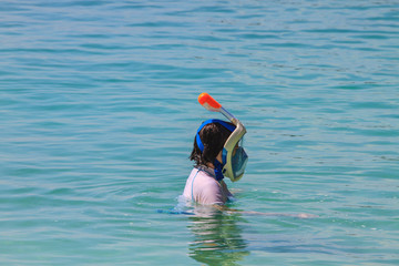 snorkeling in turquoise water