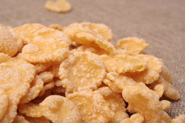 corn flakes on sack background closeup