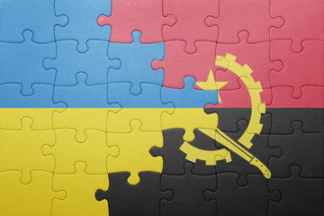 puzzle with the national flag of angola and ukraine