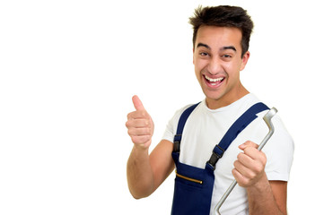 Junger Mechaniker mit Daumen hoch