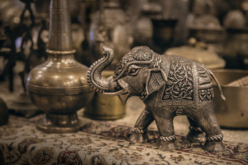 Fototapeta premium Detailed close-up elephant figurine made of metal. 