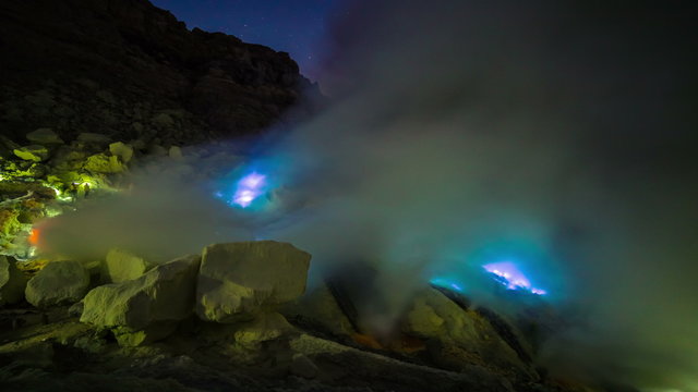 4K Timelapse. Blue flame of gas in the crater of the volcano Ijen. East Java, Indonesia - 25 July 2015
