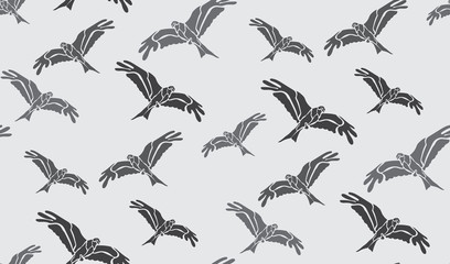 Vector seamless background of falcons. Chaotic falcons