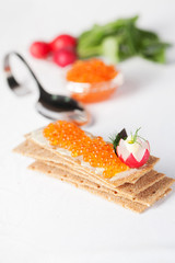 crispbread and red salmon caviar to supply the ideal figure