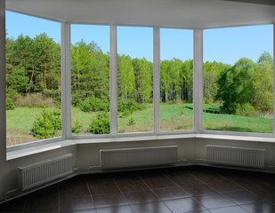 Fototapeta premium plastic windows with view of forest