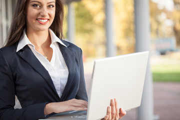 Successful businessman working at laptop