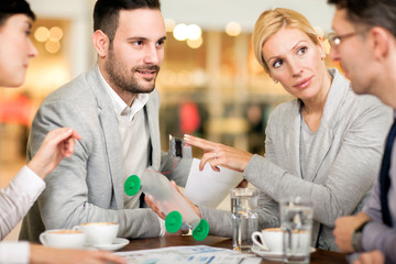 team of engineers talk about solar energy