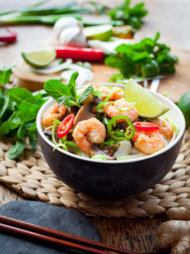 prawn noodles -  spicy asian meal with mushrooms, chili, mint and lime - bún gạo với tôm
