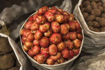 Potatoes in a sack on the market