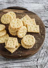 Homemade cheese cookies on a wooden rustic background
