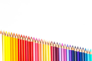 Colour pencils isolated on white background